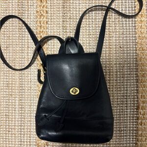Coach Black Leather Backpack with Gold Accents